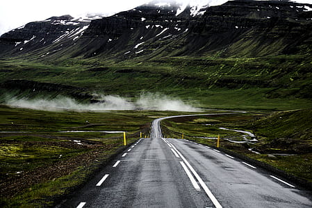asphalt road through mountain thumbnail
