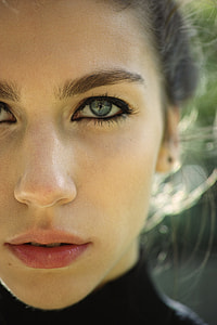 close up photo of woman with black mascara thumbnail