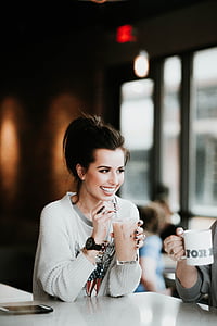 woman drinking iced beverage thumbnail