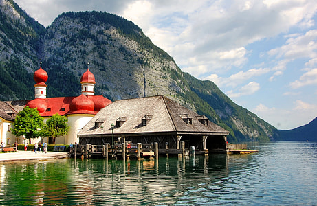 gray wooden house on body of water thumbnail