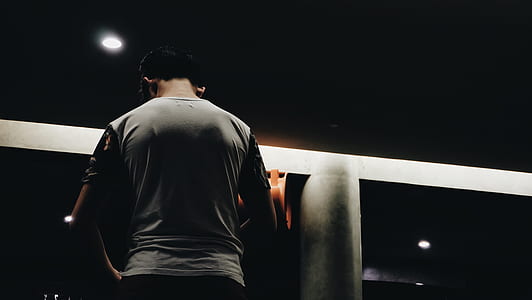 man in gray and black T-shirt thumbnail