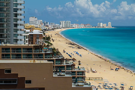 beach next to city thumbnail