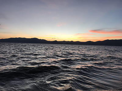 blue sea during golden hour thumbnail