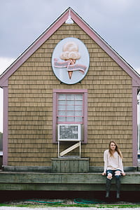woman sitting on Fary's Ice Cream shop thumbnail