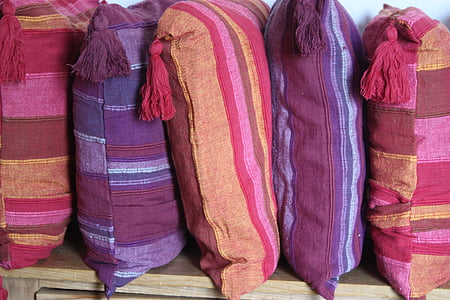 assorted-color throw pillows thumbnail