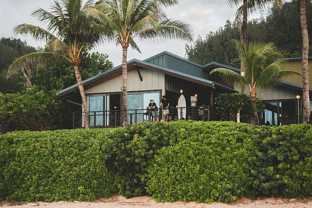 two person standing in front of house with railings thumbnail