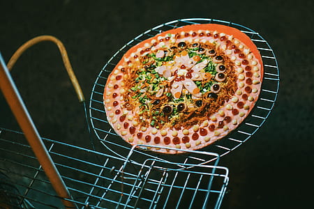 Cooked Food on Grey Metal Rack thumbnail
