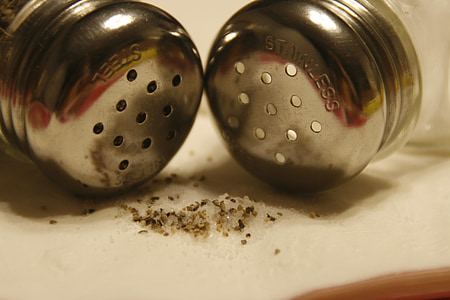 closeup photography of two stainless steel condiment shakers thumbnail