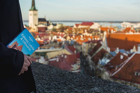 person holding book thumbnail