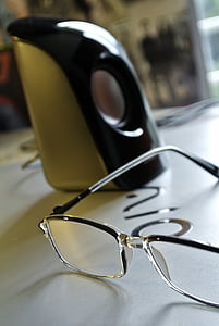 gray-framed eyeglasses on white surface thumbnail