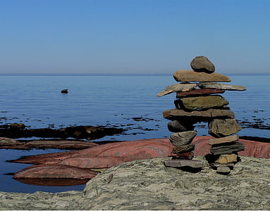 stock stone near calm body of water thumbnail