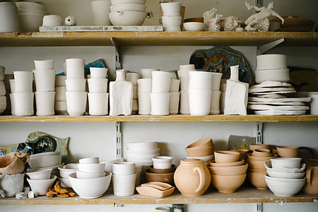assorted ceramic dinnerwares on shelf thumbnail
