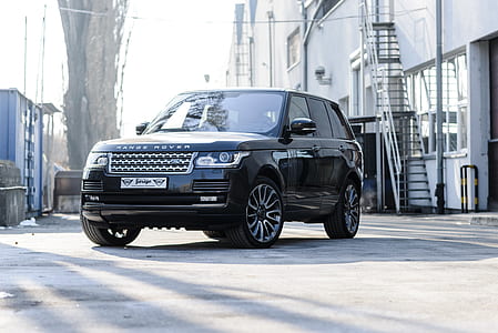 Land Rover Range Rover SUV parked near tree thumbnail