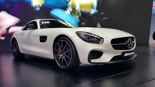 white Mercedes-Benz coupe thumbnail