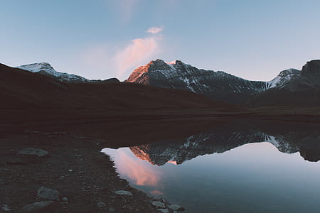 lake and mountain during daytime thumbnail