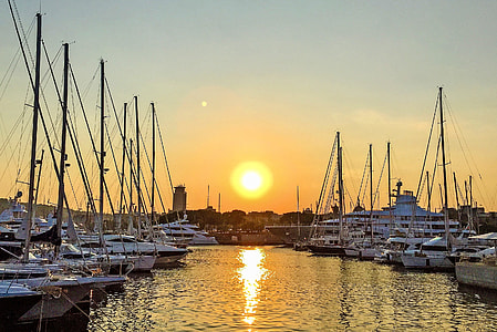 white yacht on body of water under sun thumbnail