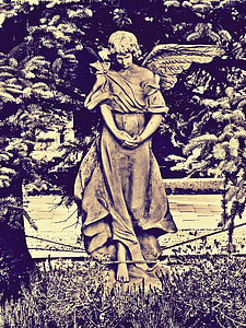 statue of angle near green leaf plants thumbnail