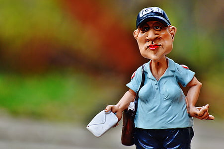 woman in blue collared top figurine thumbnail