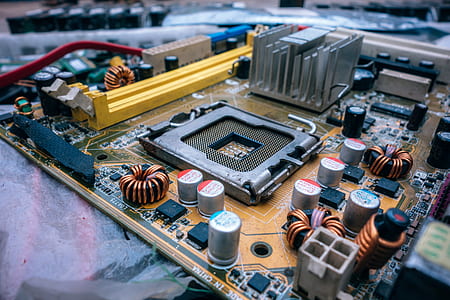 brown and black motherboard thumbnail