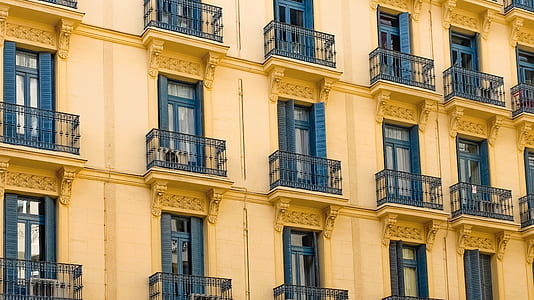 yellow and blue concrete building thumbnail