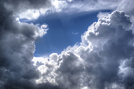 low angle view photography of sea clouds thumbnail