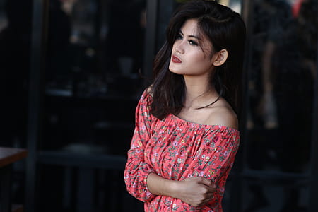 woman wearing pink and blue floral off-shoulder elbow-sleeved top thumbnail