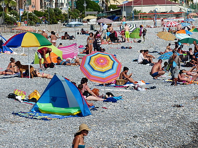 people sunbathing at beach thumbnail