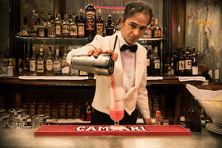 bartender holding beverage mixer thumbnail