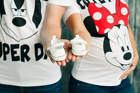 matching pair of Mickey and Minnie Mouse graphic crew-neck t-shirts thumbnail