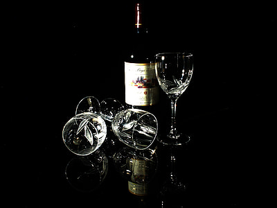 wine bottle with three clear wine glasses thumbnail