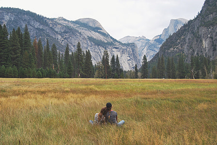 two person on grass field thumbnail