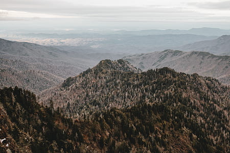 mountain under white clouds during daytime thumbnail