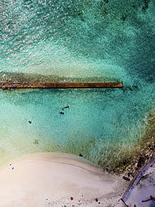 aerial view of blue body of water thumbnail