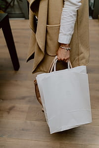Woman with blank paper bag thumbnail