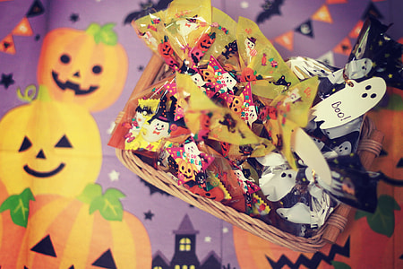 assorted candies on brown wicker basket thumbnail