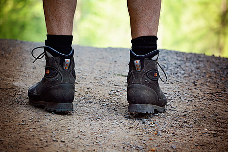 person wearing black leather hiking boots thumbnail