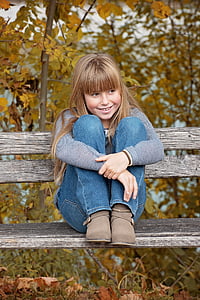 girl wearing blue denim pants thumbnail