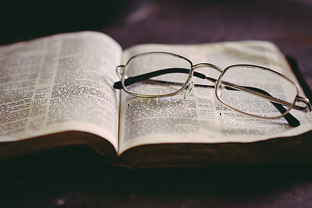 eyeglasses on book thumbnail