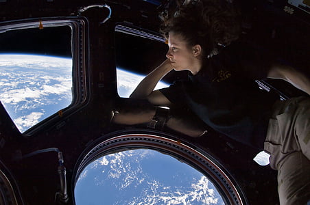 woman looking at the globe earth thumbnail