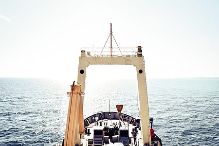 white and black ship on body of water thumbnail