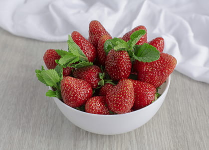 bunch of strawberries in white bowl thumbnail