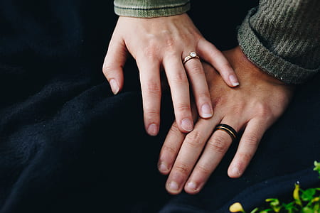 man and woman wearing wedding rings thumbnail