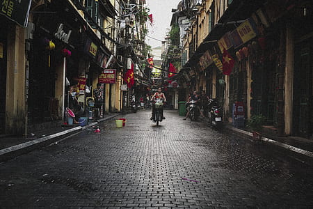 person riding on a motorcycle during daytime thumbnail