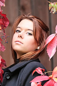 woman wearing black coat thumbnail