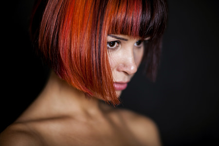 red and black hair woman thumbnail