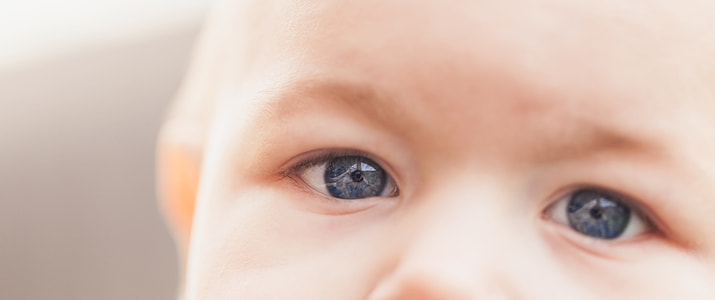 close up photo of baby's two eyes thumbnail