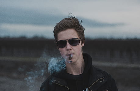 man smoking cigar thumbnail