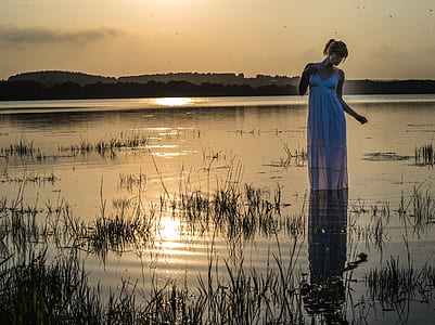 woman in white sleeveless dress photography thumbnail