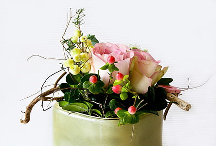 pink roses and magical pumpkin in green vase thumbnail