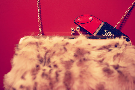brown and beige fur clasp wallet thumbnail